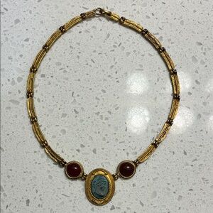 Gold-Tone Cameo Pendant Necklace with Red Accents